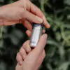 Matador_WaterproofCanister_Small_Lifestyle_InHand_Opening_02
